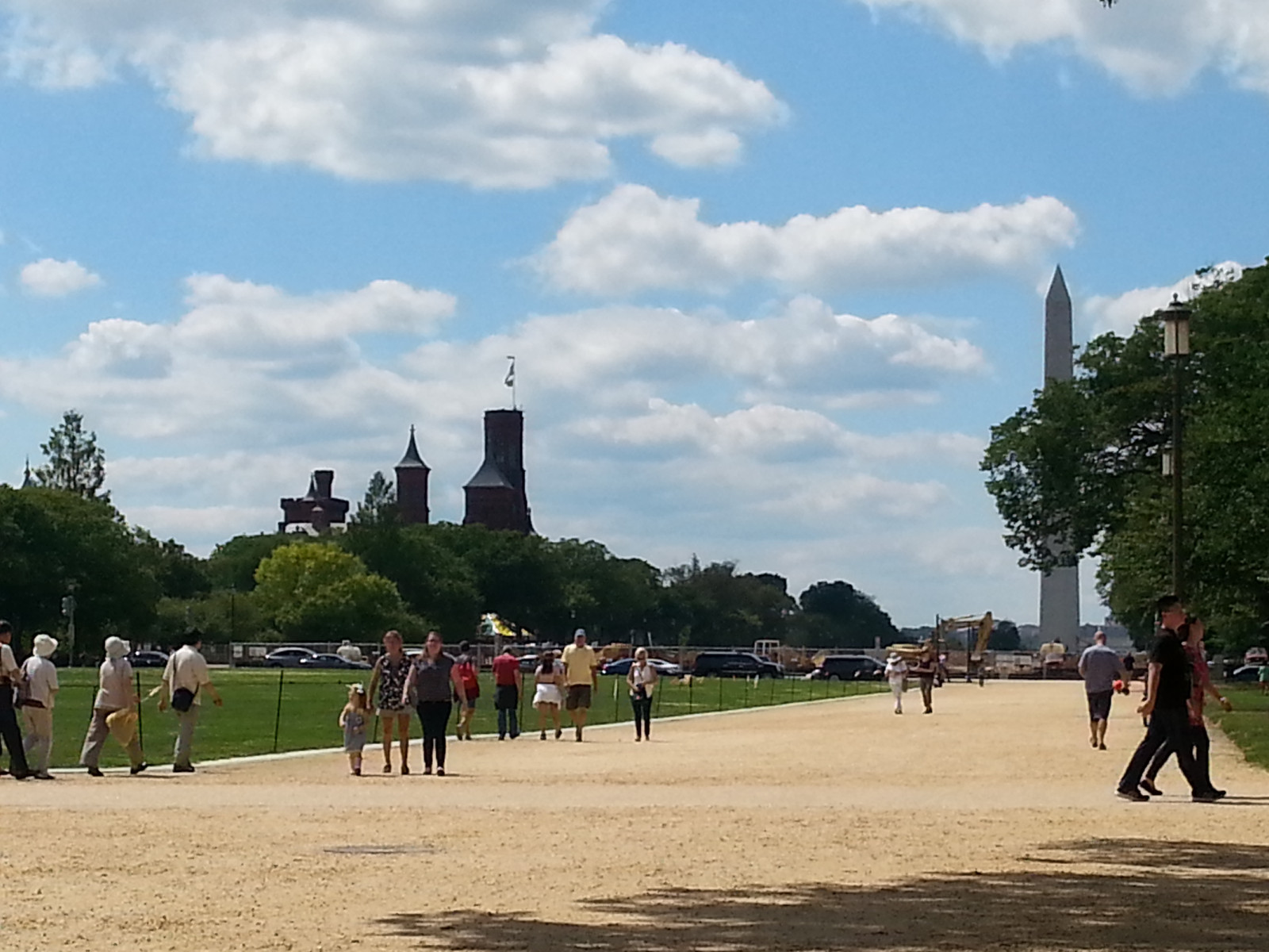 The National Mall, looking toward the Smithsonian castle (designed by James Renwick) and the Washington Memorial