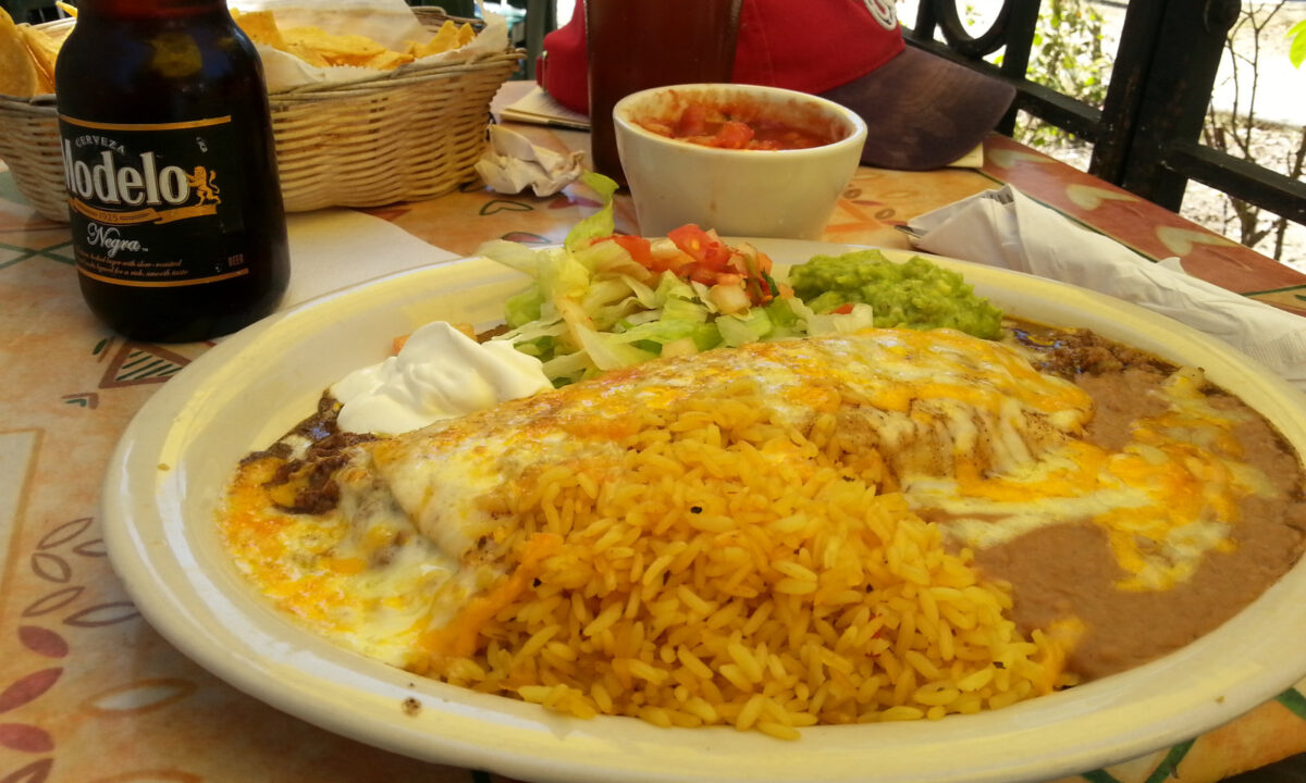 Look at all that foody goodness! A burrito absolutely smothered in rice and cheese! Chips! Salsa! A Modelo Negra! Sitting outside, eating lunch as people should!