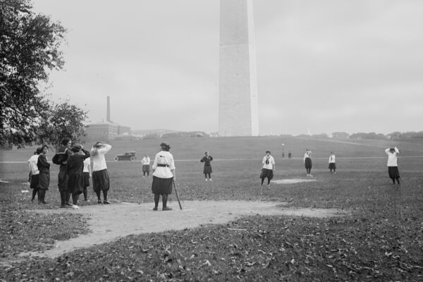 Women playing baseball by the Washington Monument, October 1919