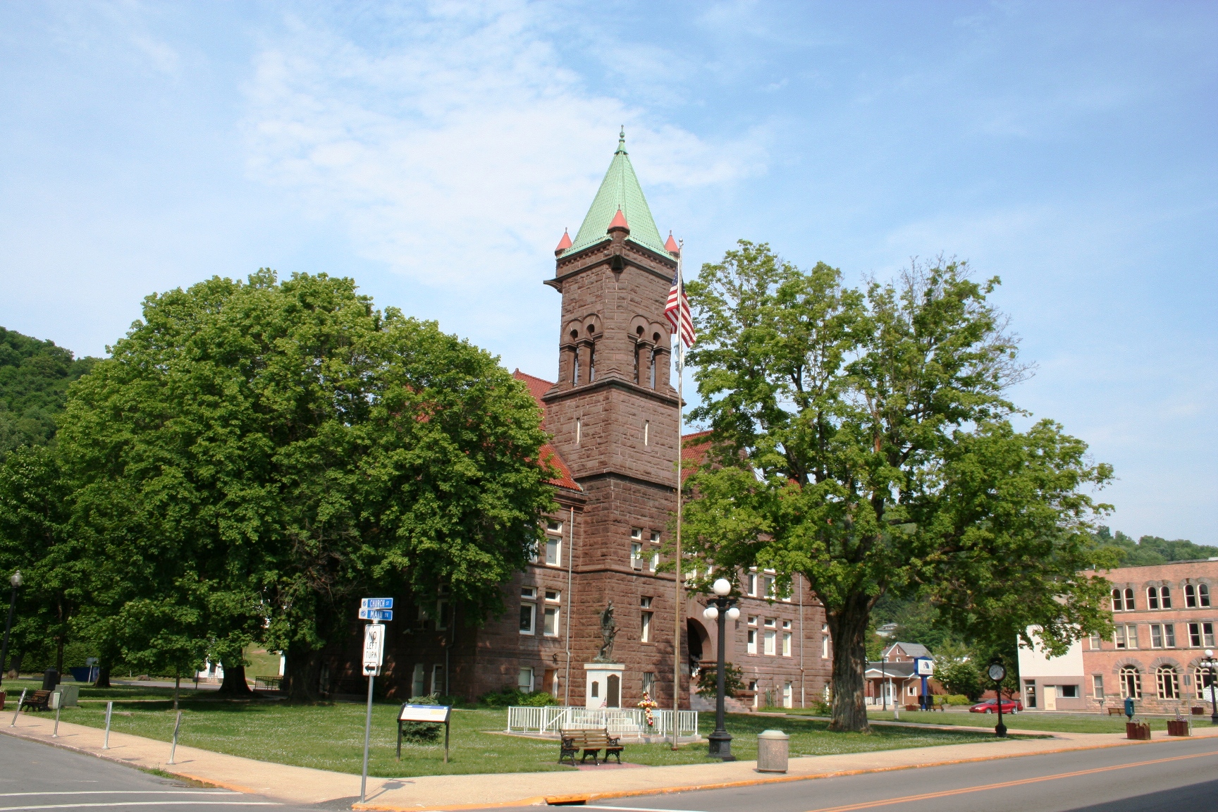 The Barbour County Courthouse. The Spirit of the American Doughboy statue stands on the lawn.