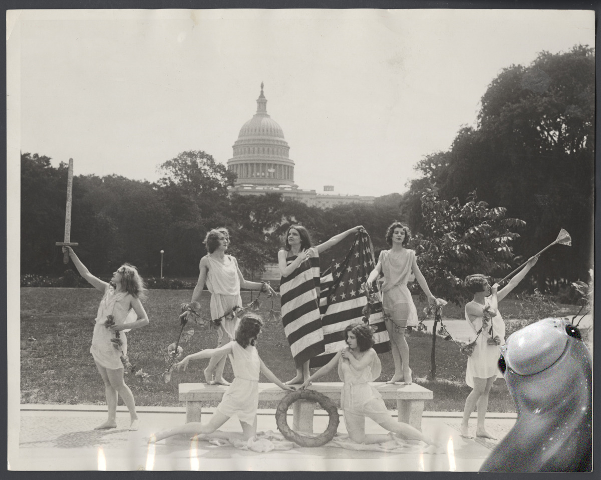 A group of women are posing in front of the Capitol Building in the 1920s -- and Murf jumps into the shot