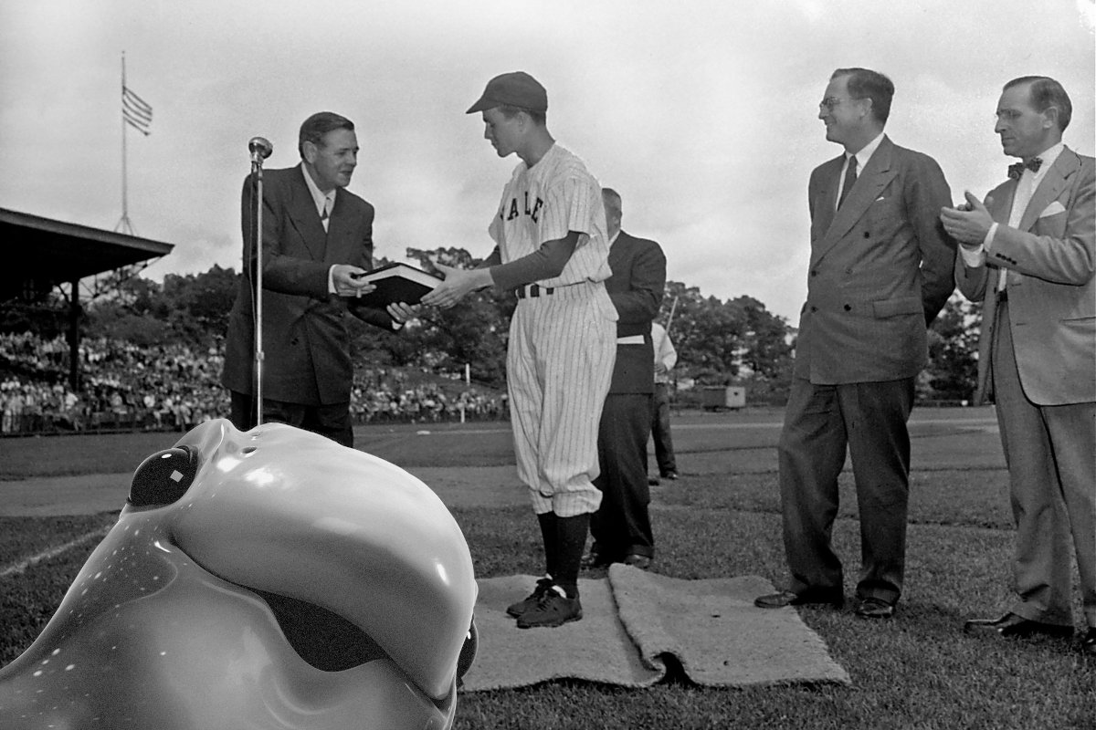 Babe Ruth is presenting his autobiography to George H.W. Bush, captain of the Yale baseball team -- and Murf gets in the shot