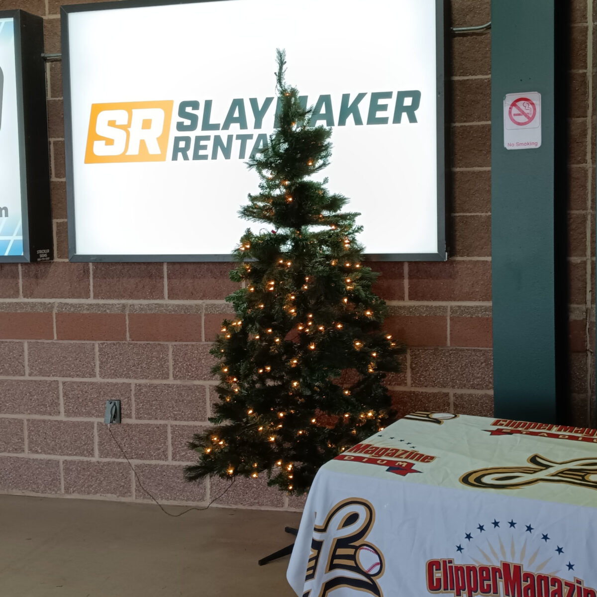 A lighted Christmas tree erected on the stadium concourse