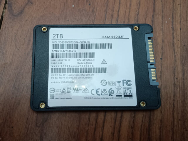 The SSD from the back, showing another nice label, this one full of barcodes and logos and the like