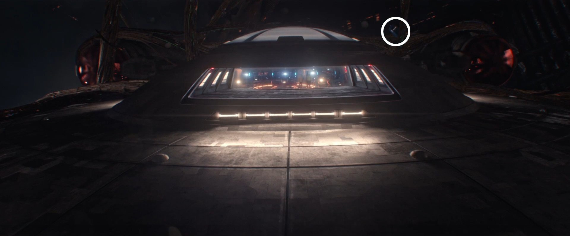 Screencap of the episode, with the TARDIS circled upper right center by the Enterprise's nacelle in an FX shot