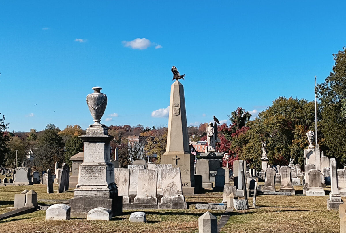 The grave of Jerome Bonaparte, with a vulture perched atop the obelisk that bears the crown and arms of Westphalia