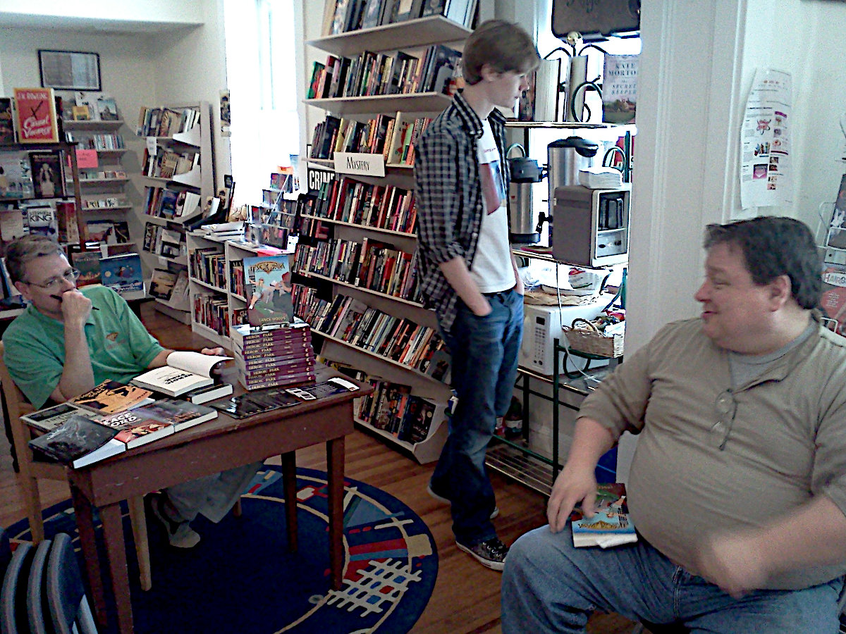 Lance Woods and Alan Chafin talking in a bookstore