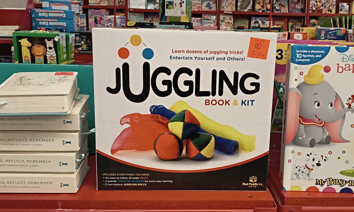 A juggling starter kit, with book and three juggling bean bags