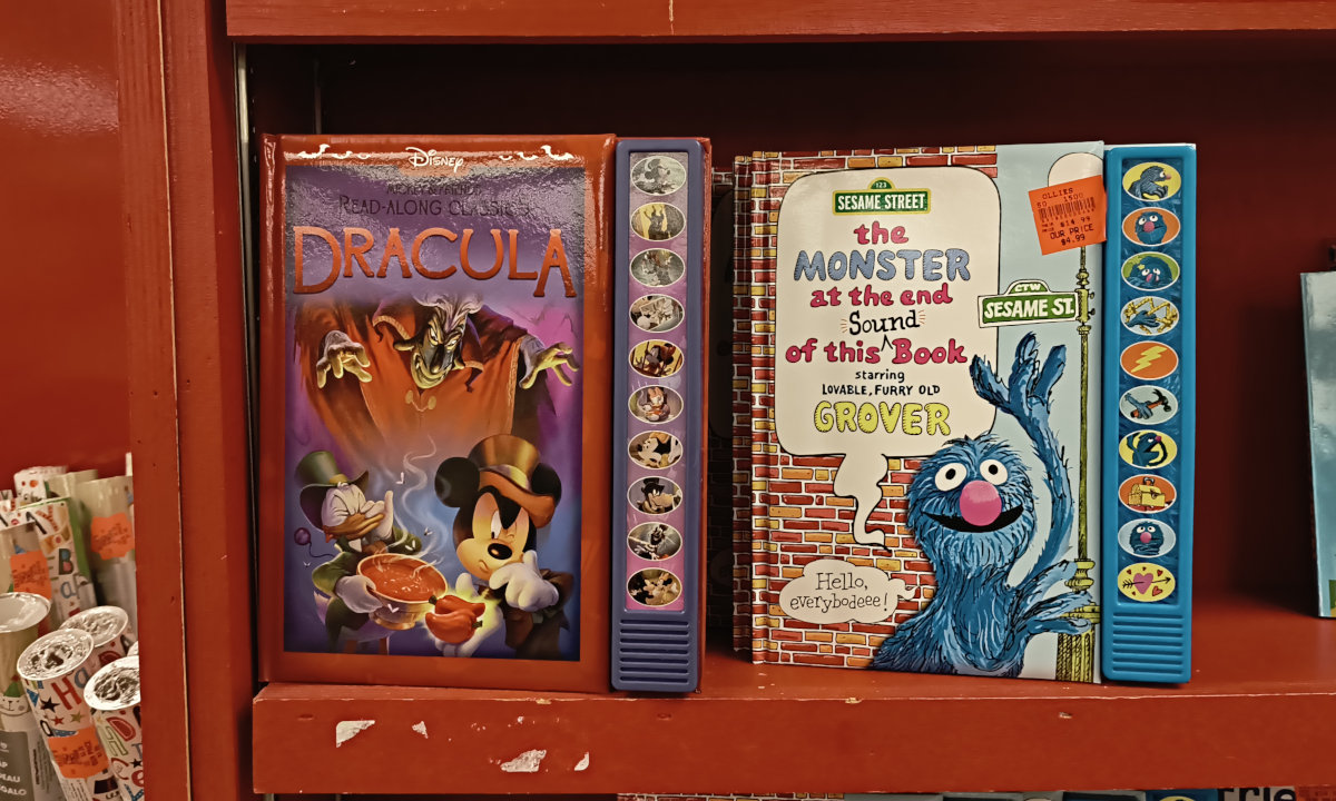 Sound-enabled books for kids, one Disney's Dracula with Mickey and the Gang, the other the classic The Monster at the End of This Book withe lovable, furry old Grover