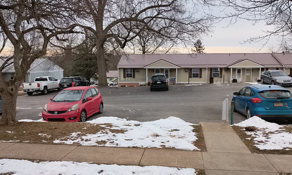 Before the storm, a few piles of snow on the ground.