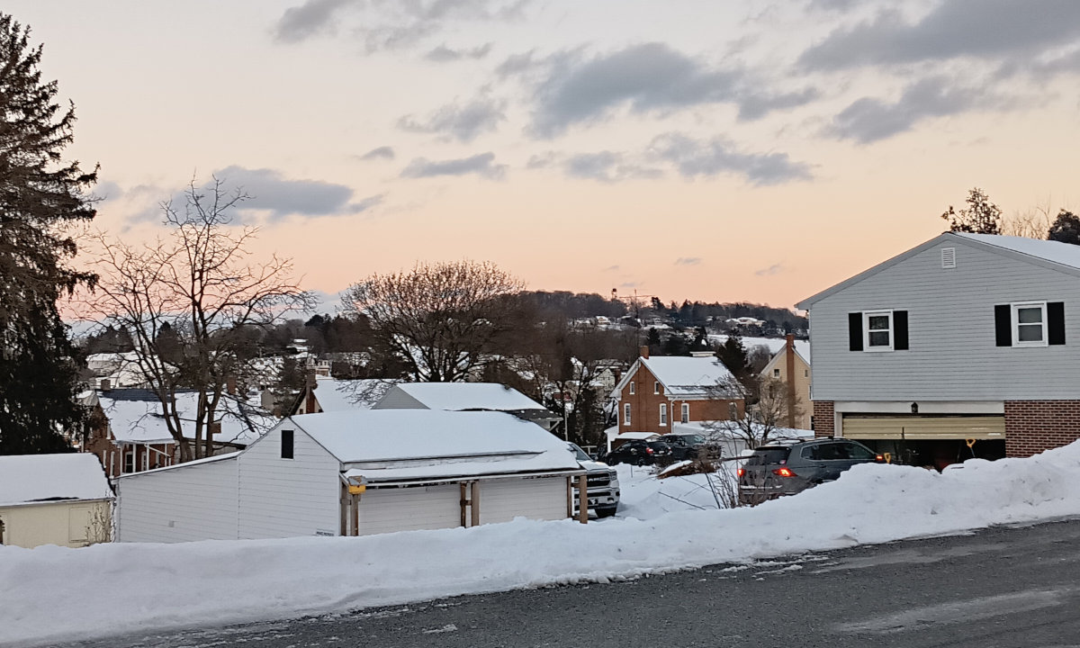 The sky is pink at the horizon, looking toward the fire tower over in Windsor