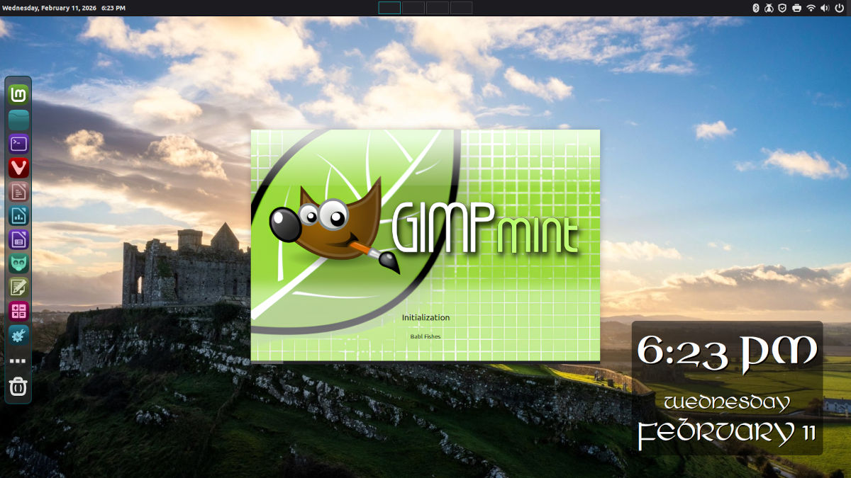 Screenshot of my Linux Mint Debian Edition desktop, with the vintage green "GIMP Mint" splash screen from 2008's Linux Mint 5.