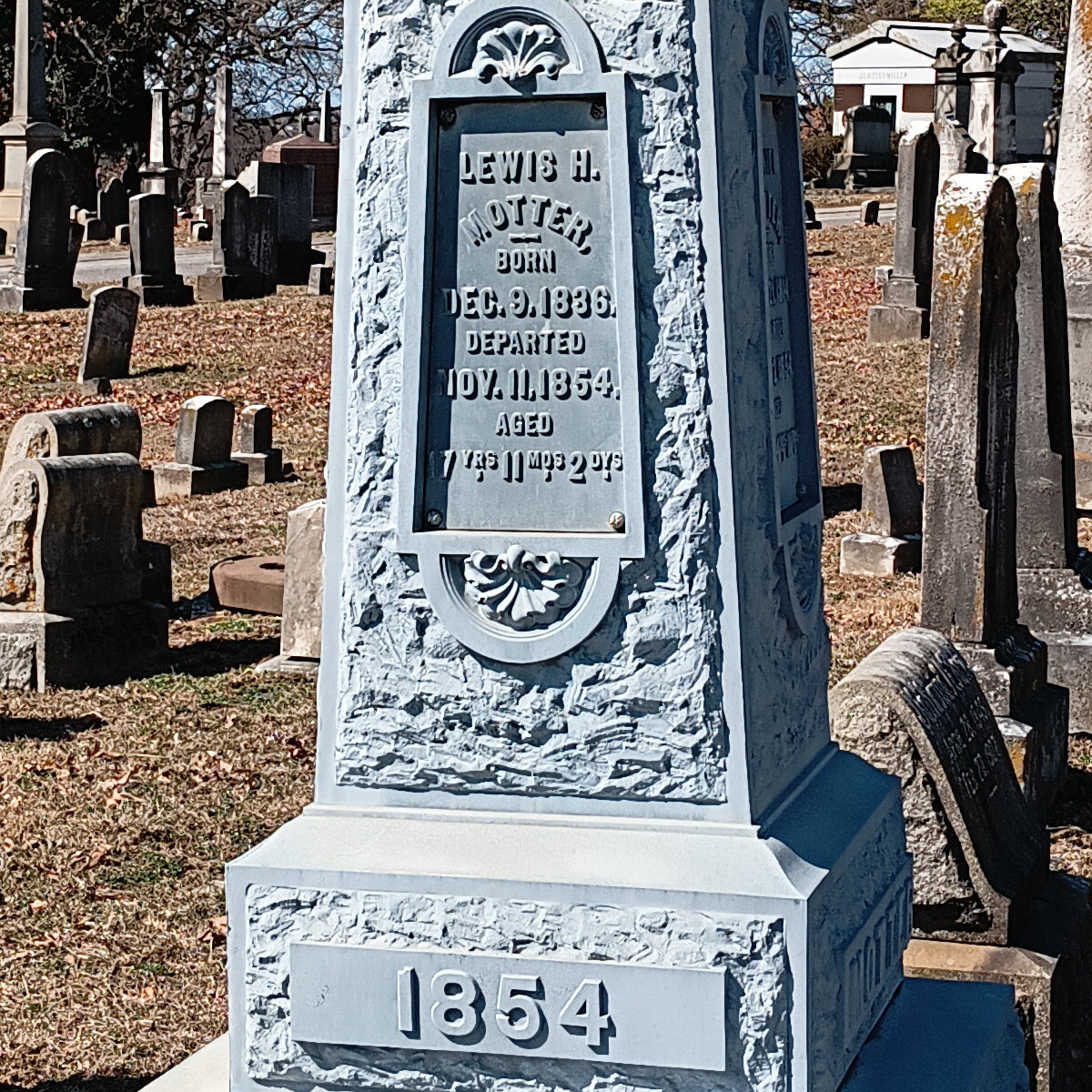 The side on the light gray obelisk for Lewis Motter, born in December 1836, died November 1854 a few weeks shy of his 18th-birthday.