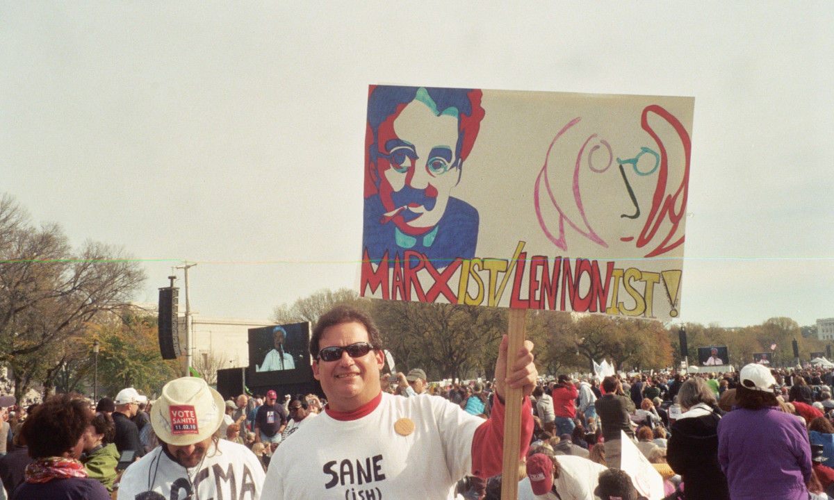 A sign for a Marxist/Lennonist -- ie, Groucho Marx and John Lennon -- held by someone before the Rally began