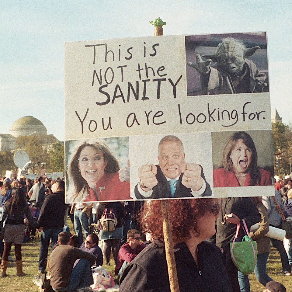 A clever sign -- Yoda saying, "This is not the sanity you are looking for," with images of Sarah Palin, Glenn Beck, and Christine O'Donnell below