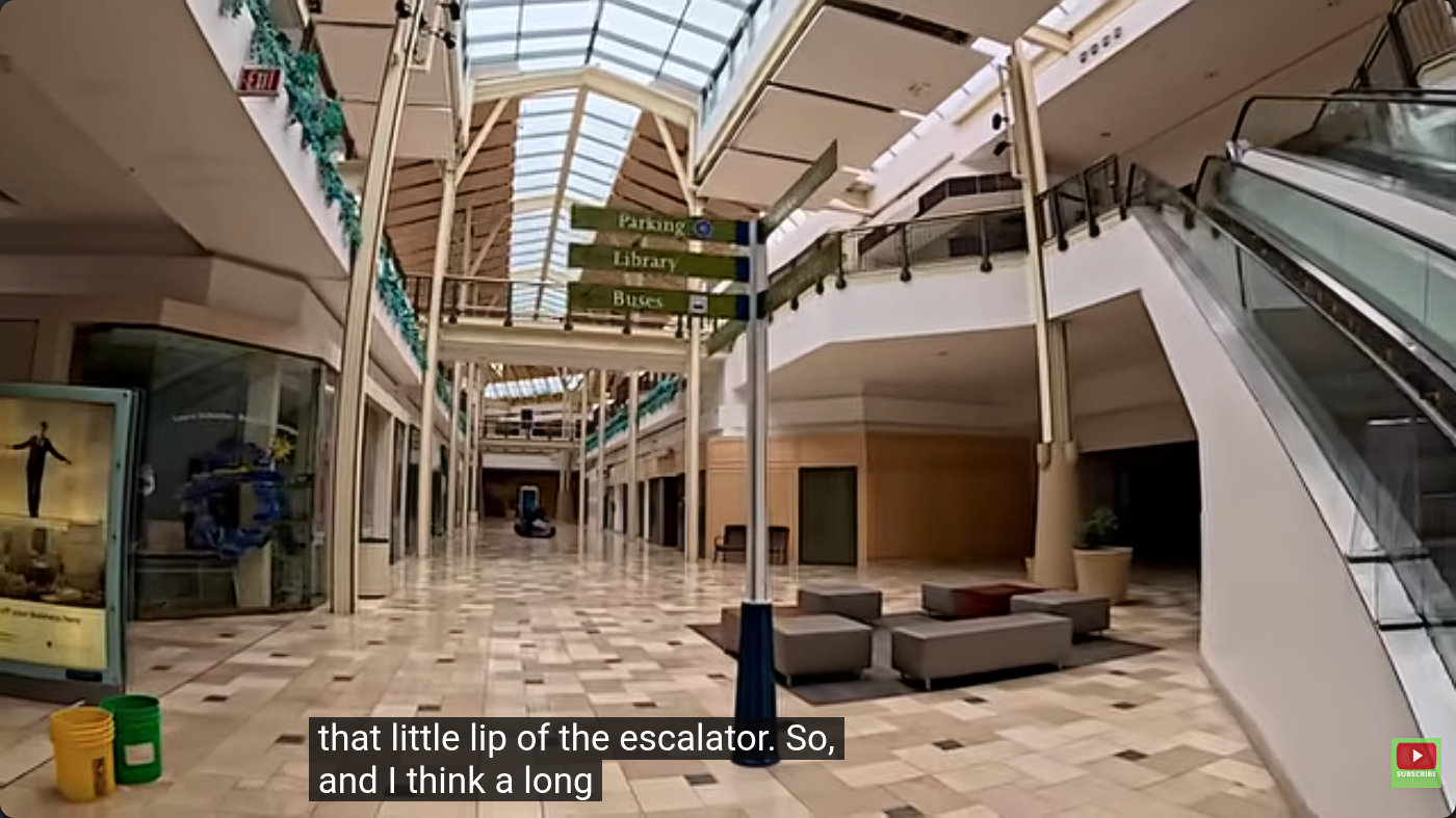 The lower level of Exton Square Mall, late spring 2026, before it closed, showing nothing but empty storefronts